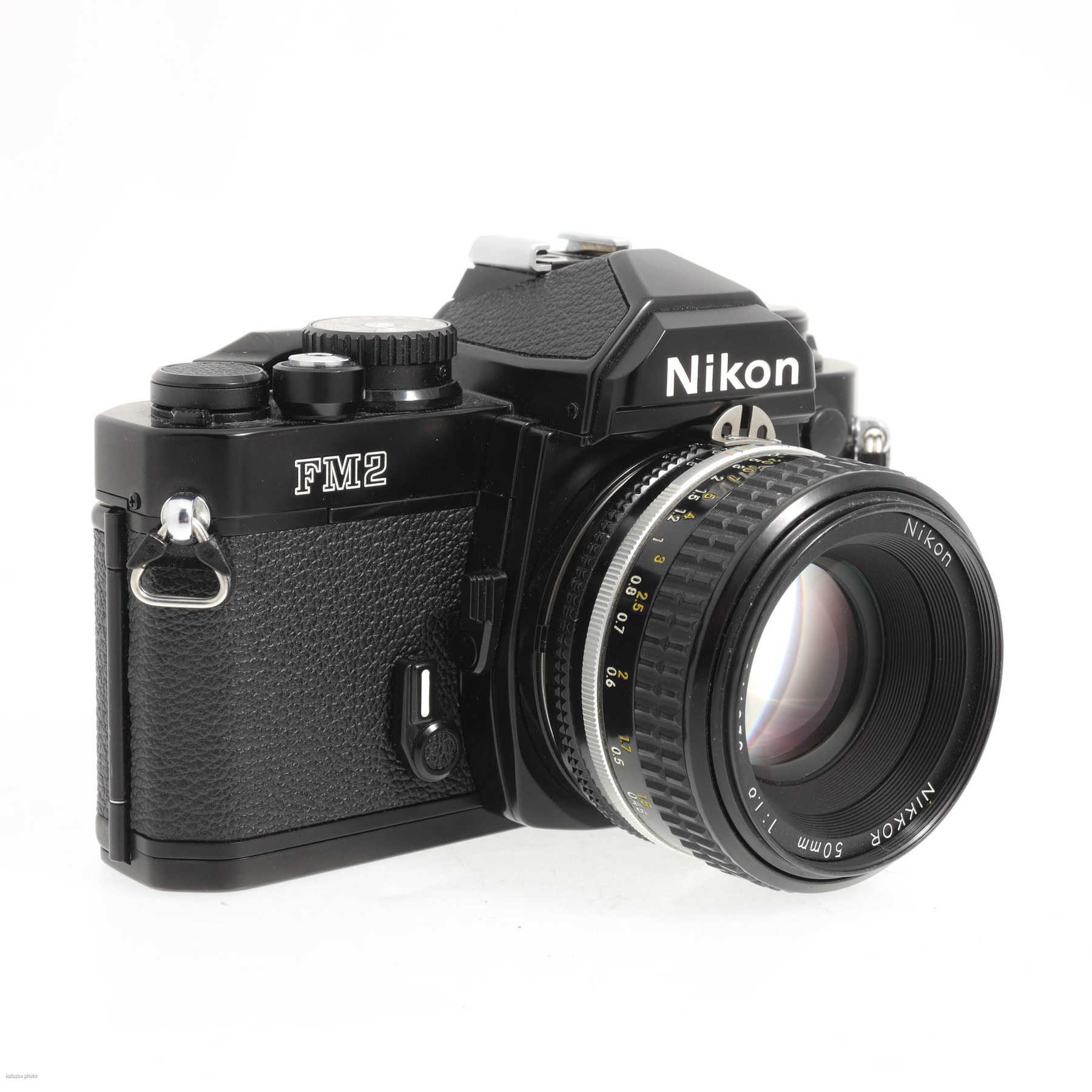 Nikon FM2 с объективом 50mm f/1.8 Nikkor AI-S Nikon FM2 с объективом 50mm f/1.8 Nikkor AI-S