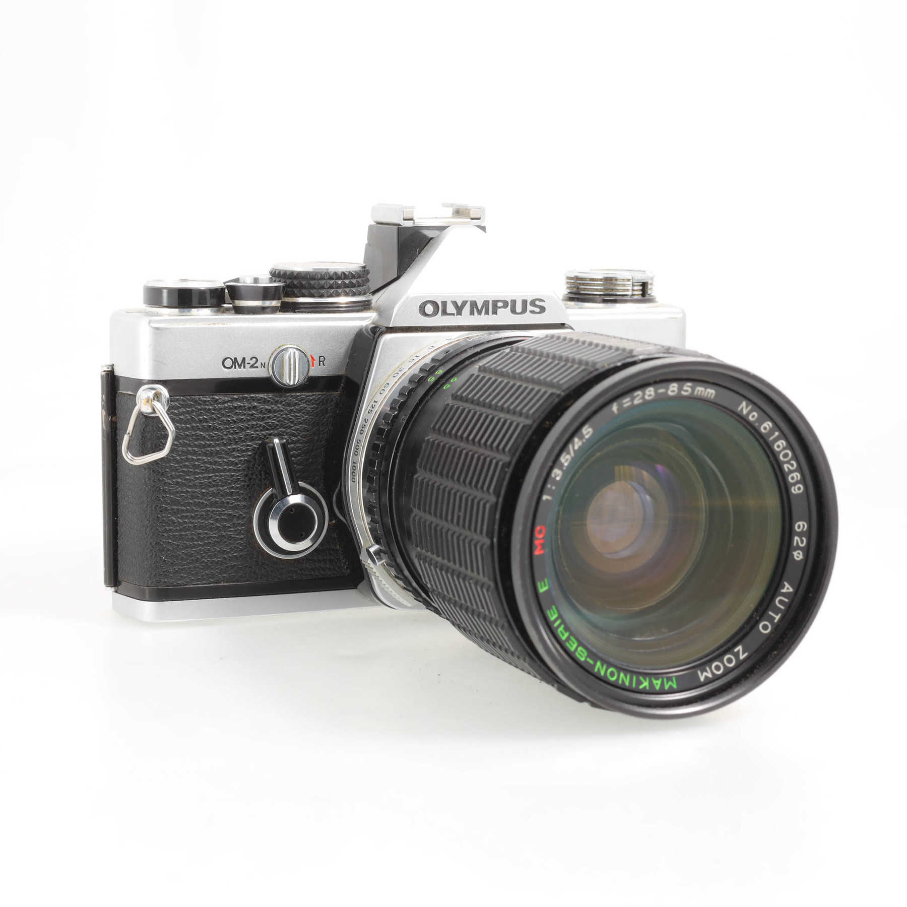 Olympus OM-2n с мотором, двумя зумами и телеконвертером Olympus OM-2n с мотором, двумя зумами и телеконвертером