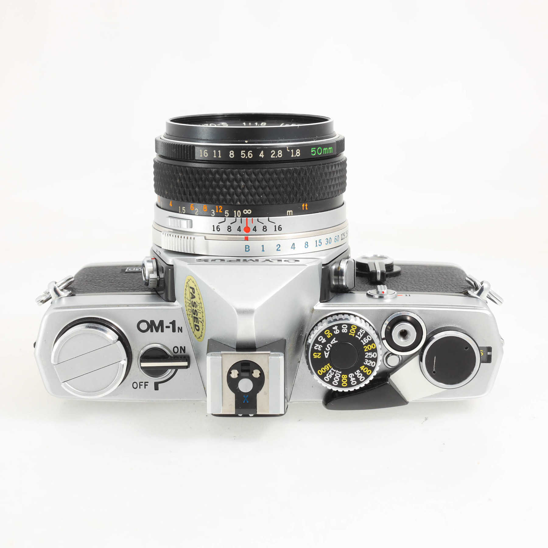 Olympus OM-1n с объективом 50mm f/1.8 F.Zuiko Olympus OM-1n с объективом 50mm f/1.8 F.Zuiko