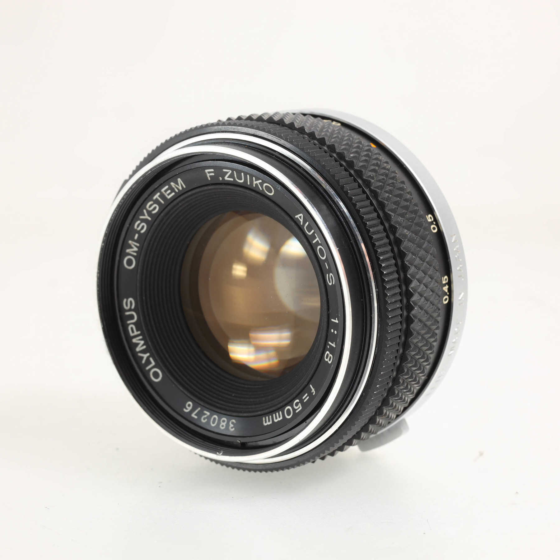 Olympus OM-1n с объективом 50mm f/1.8 F.Zuiko Olympus OM-1n с объективом 50mm f/1.8 F.Zuiko