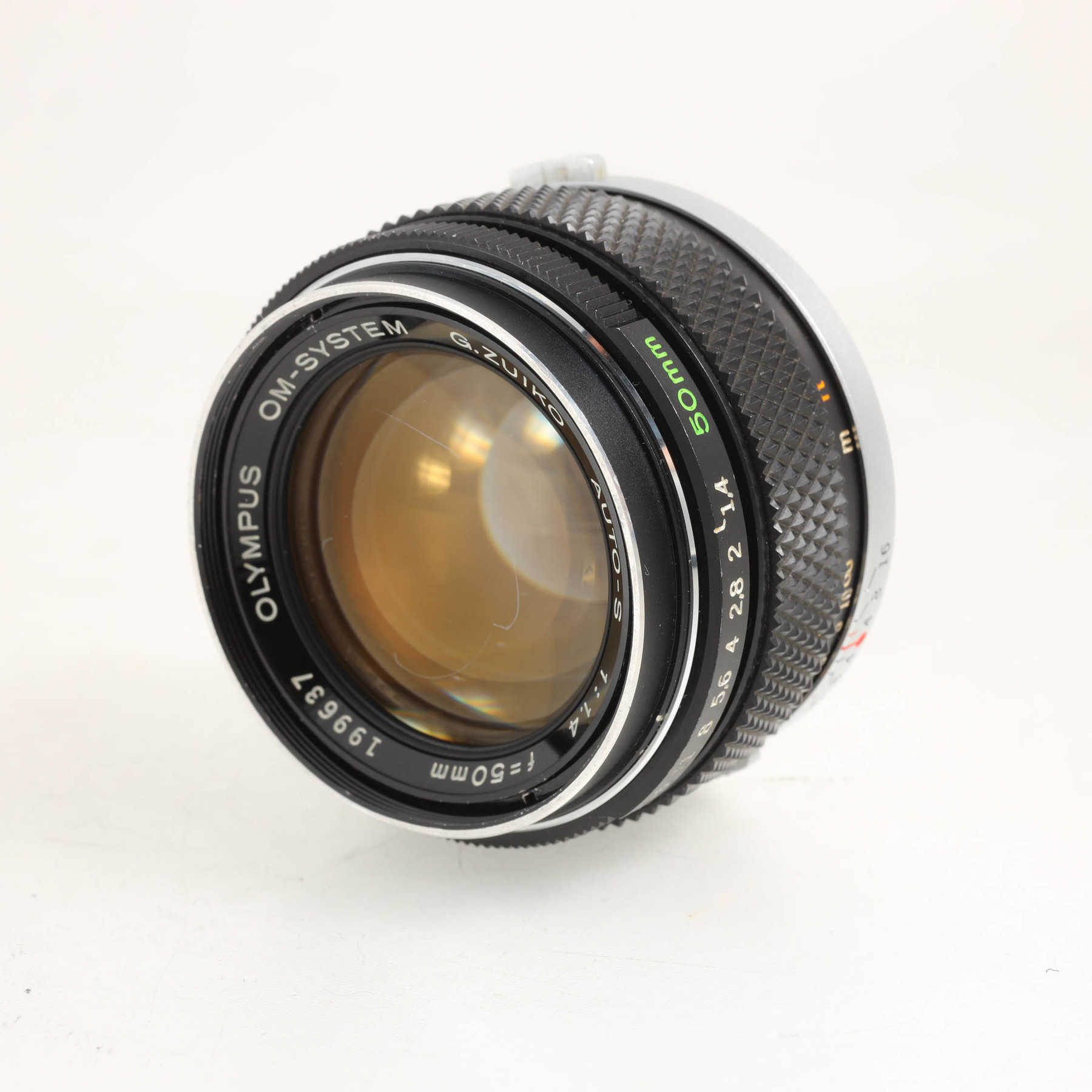 Olympus OM-1n с объективом 50mm f/1.4 G.Zuiko Auto-S Olympus OM-1n с объективом 50mm f/1.4 G.Zuiko Auto-S