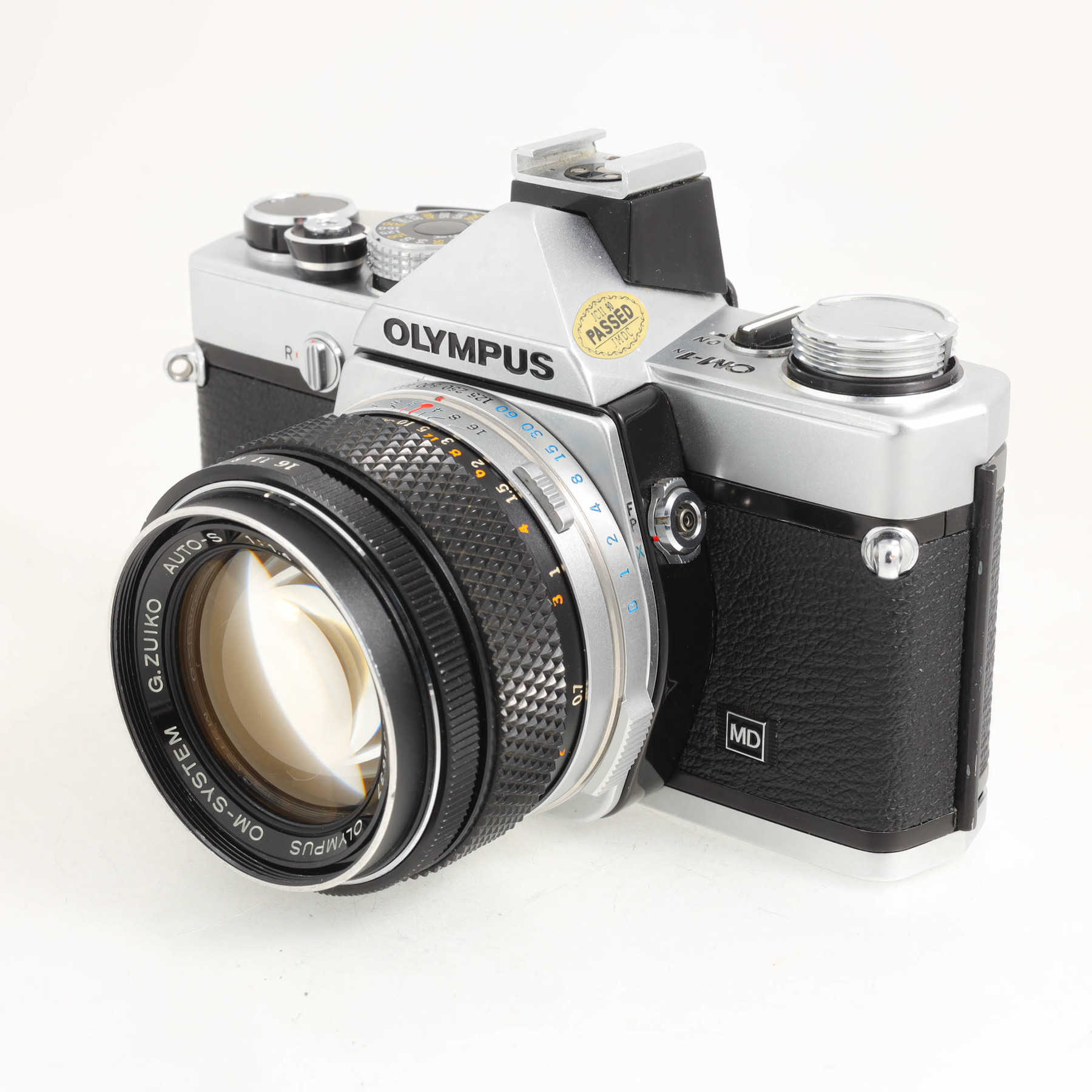 Olympus OM-1n с объективом 50mm f/1.4 G.Zuiko Auto-S Olympus OM-1n с объективом 50mm f/1.4 G.Zuiko Auto-S