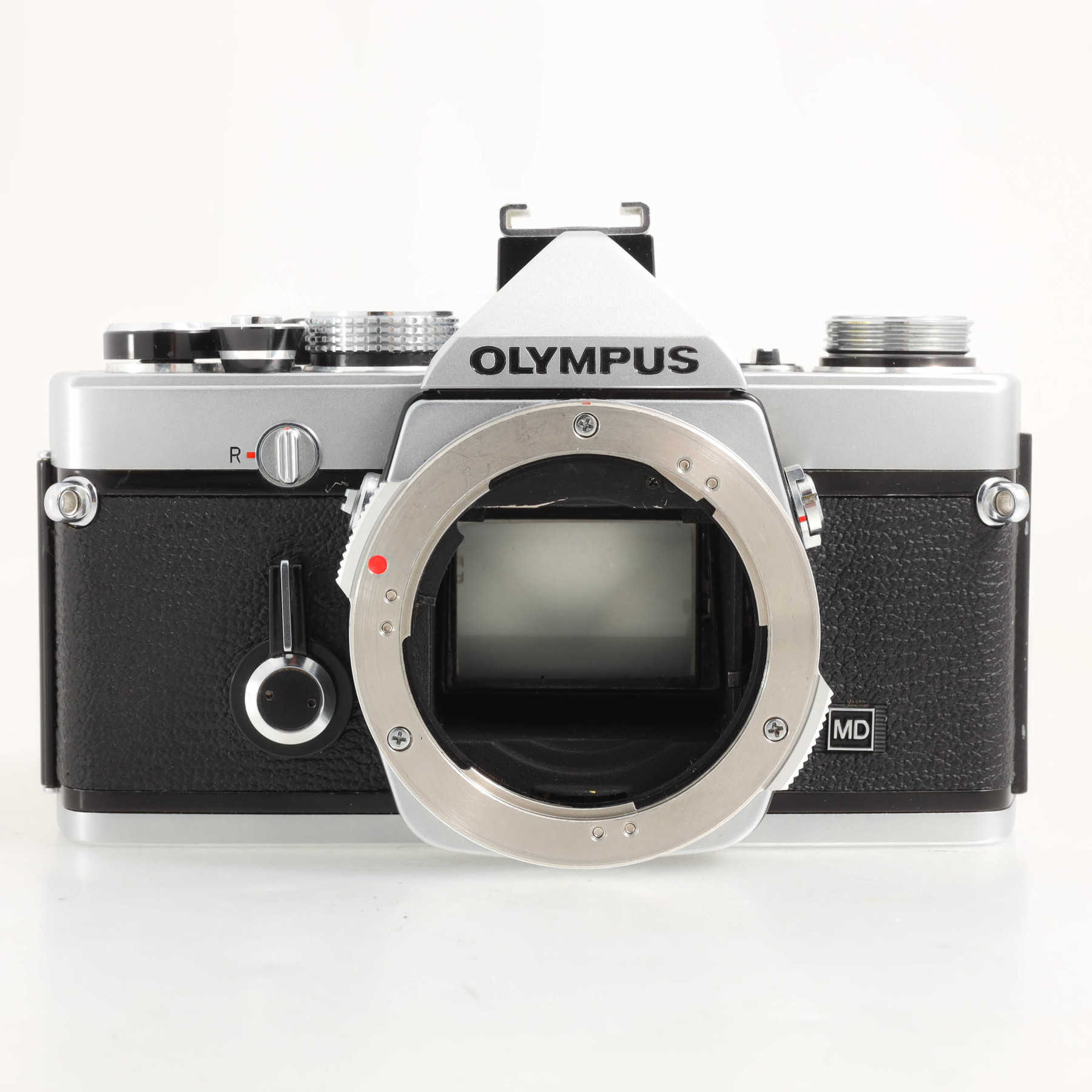 Olympus OM-1n с объективом 50mm f/1.4 G.Zuiko Auto-S Olympus OM-1n с объективом 50mm f/1.4 G.Zuiko Auto-S