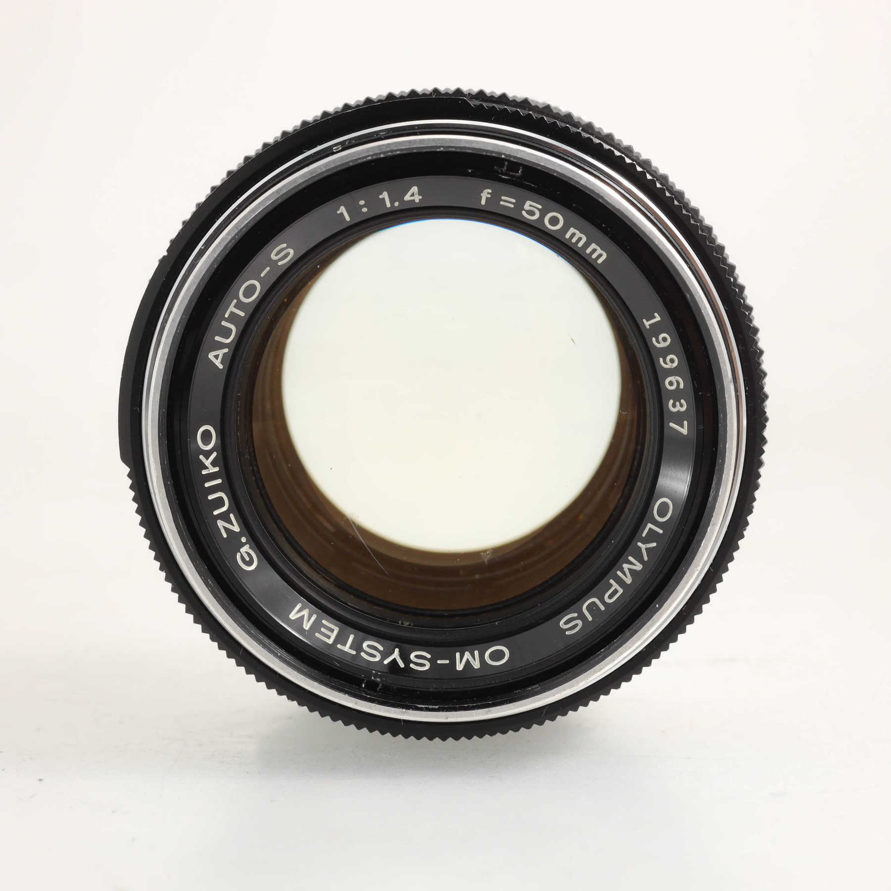 Olympus OM-1n с объективом 50mm f/1.4 G.Zuiko Auto-S Olympus OM-1n с объективом 50mm f/1.4 G.Zuiko Auto-S